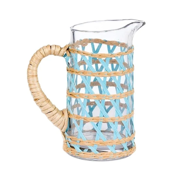 Vaso de cristal envuelto en algas marinas