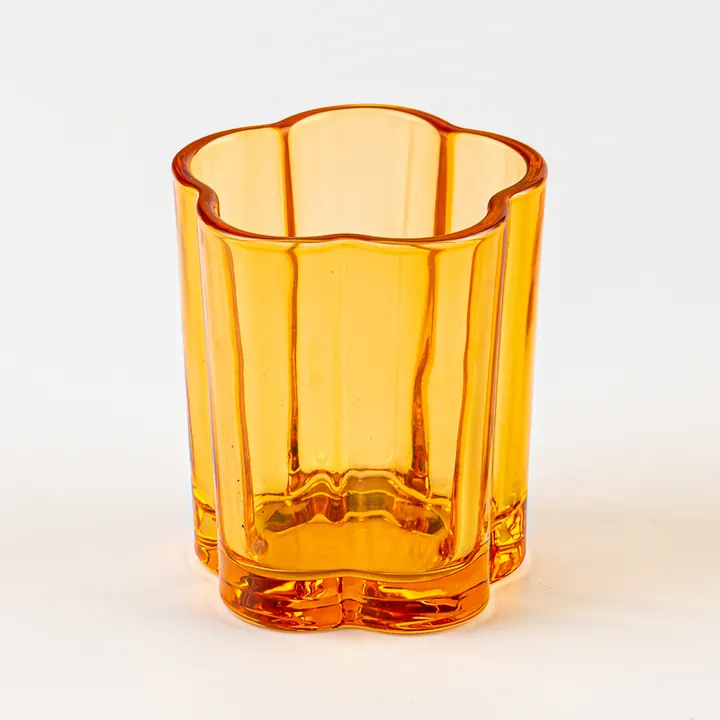 Amber flower shaped glass candle jar