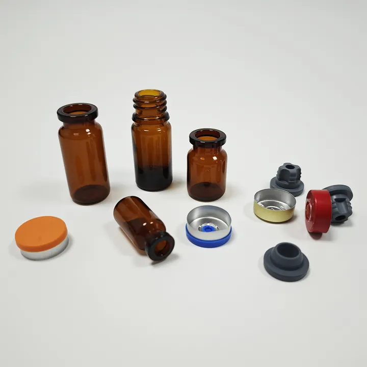 Amber glass vials with assorted caps and rubber stoppers