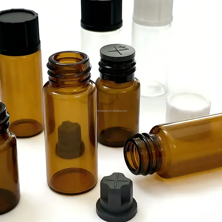Amber glass sample vials with black and white caps and inner plugs