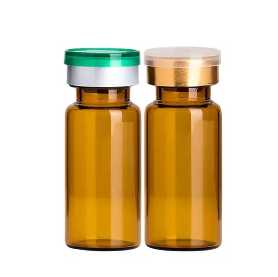 Two amber glass vials with silver seals and green and clear flip caps