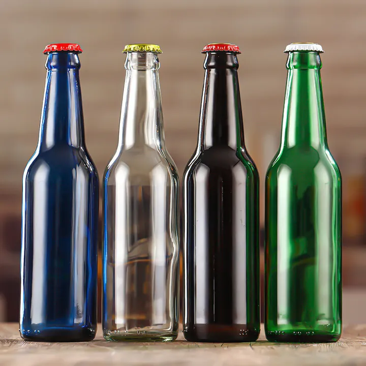 Beer bottles in multiple colors with crown caps