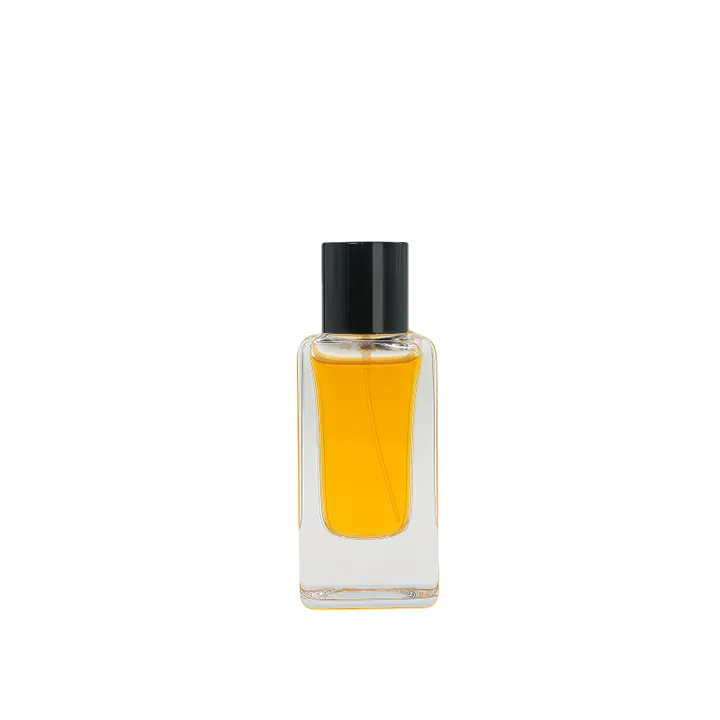 Clear square roll-on bottle with amber liquid and black cylindrical cap