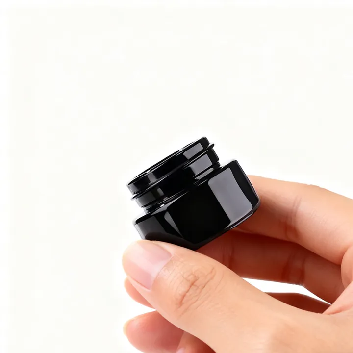Black low profile pill jar with childproof safety cap