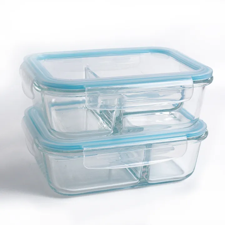 Two blue lid divided glass containers stacked together
