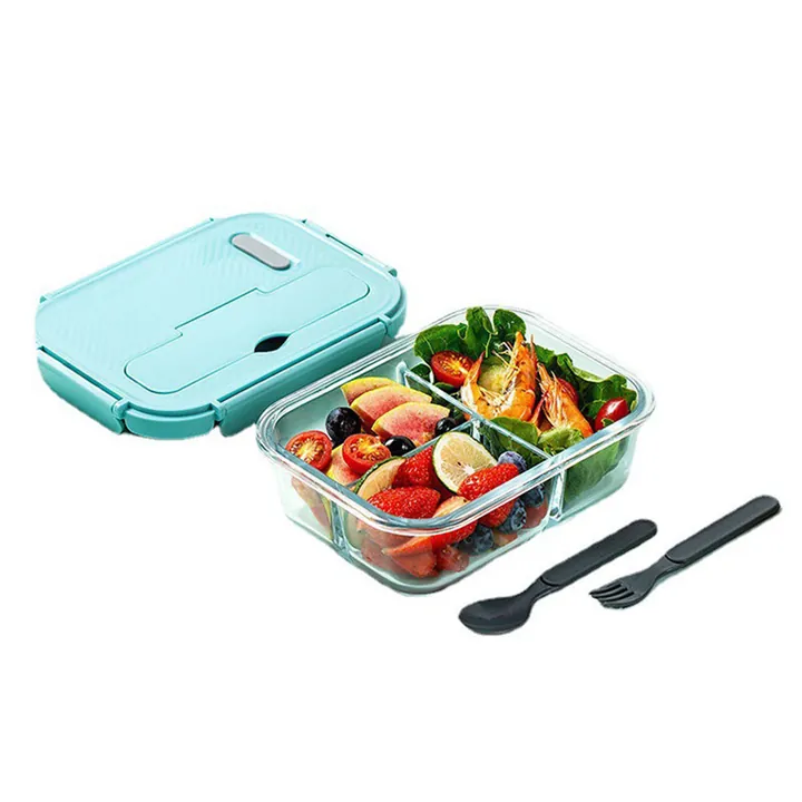Blue green lid divided glass lunch box with fruit vegetables and shrimp
