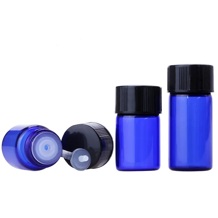 Frasco de cristal azul con inserto reductor y tapón