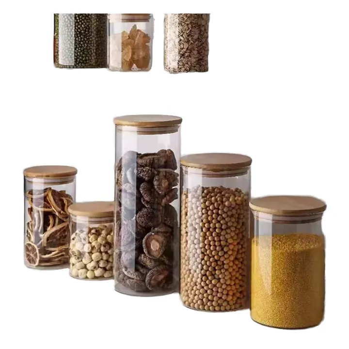 Glass storage jars with bamboo lids filled with beans