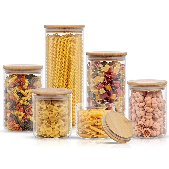Bamboo lid glass containers filled with pantry ingredients