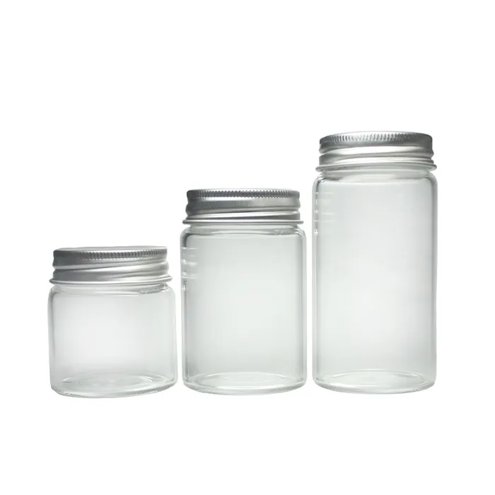 Transparent glass jars with silver metal lids