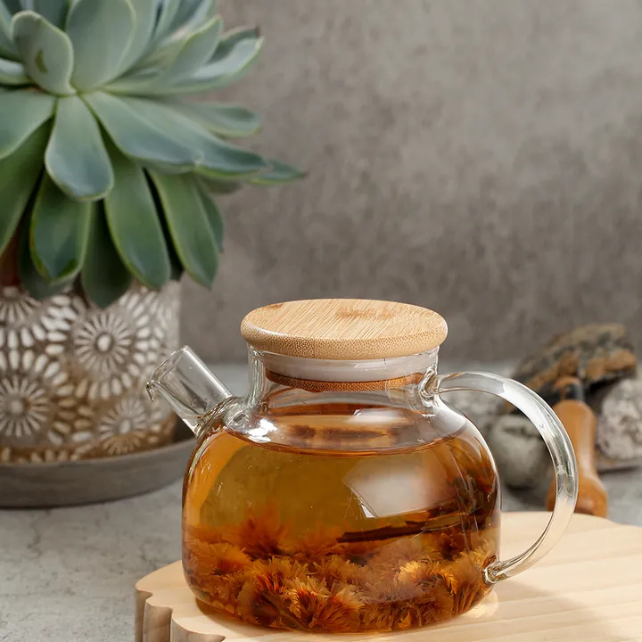 Théière ronde en verre en forme de fleur avec couvercle en bambou