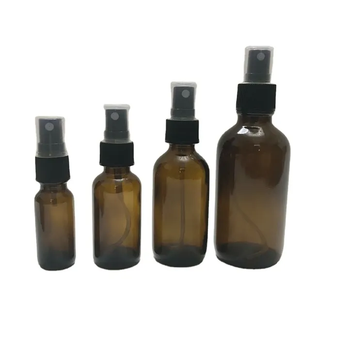 Amber Boston round spray bottles with black sprayers