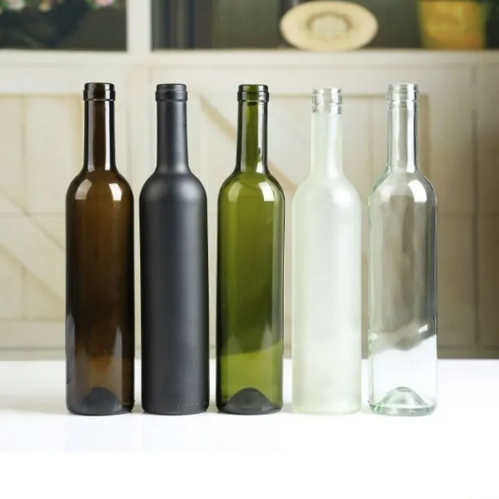 Multi color Burgundy wine bottles displayed on a kitchen countertop