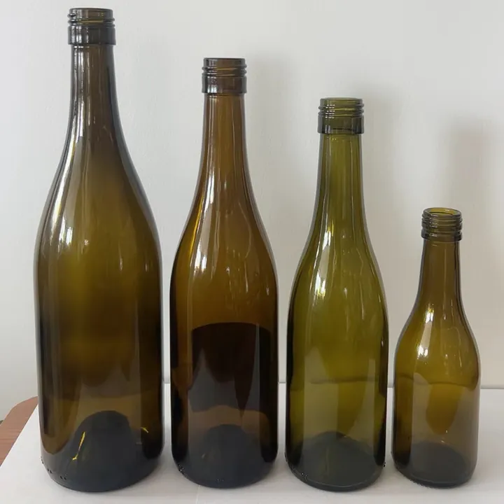 Burgundy wine bottles in different capacities displayed as a size series
