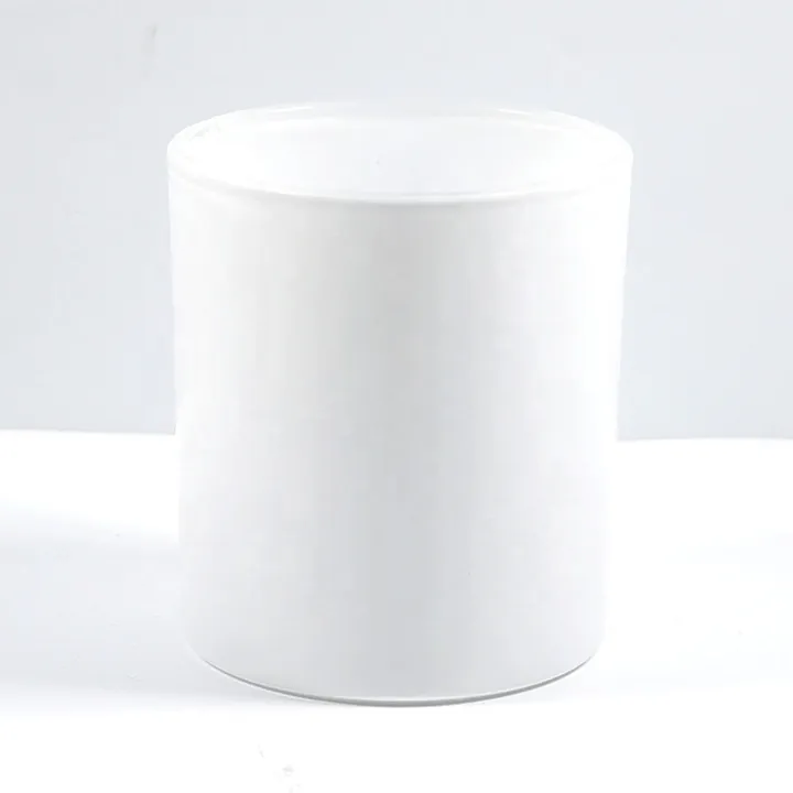 Matte white cylindrical candle jar displayed clearly