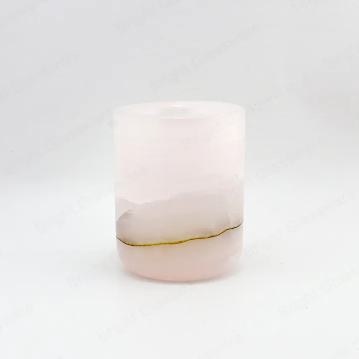 Pink onyx style candle jar with visible stone texture