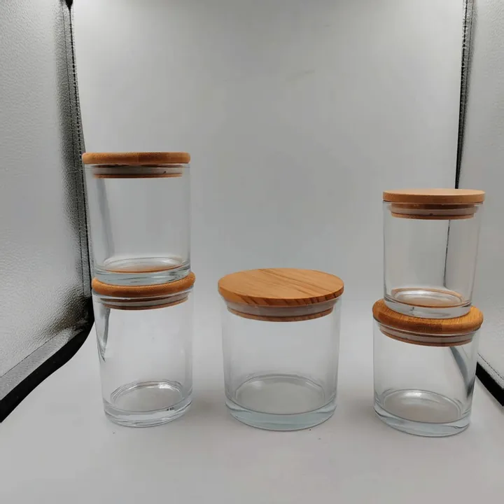 Clear glass candle jars with cork lids in different sizes