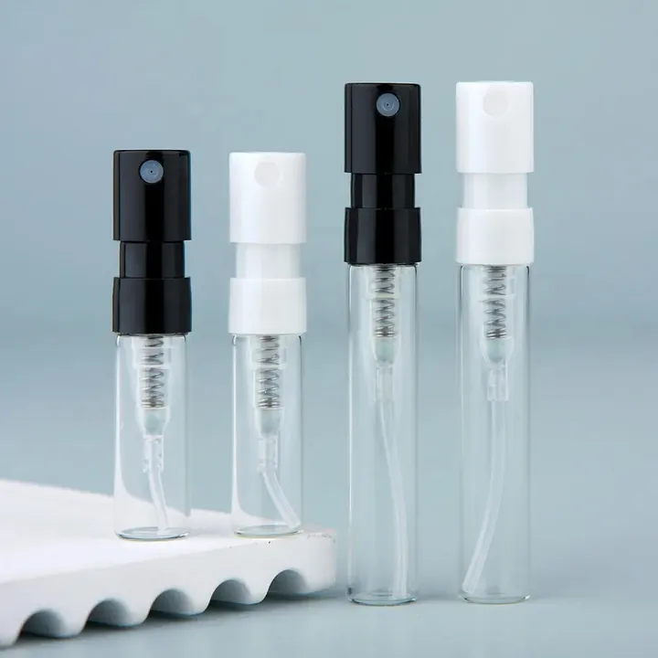 Clear slim perfume sample spray vials with black and white sprayers