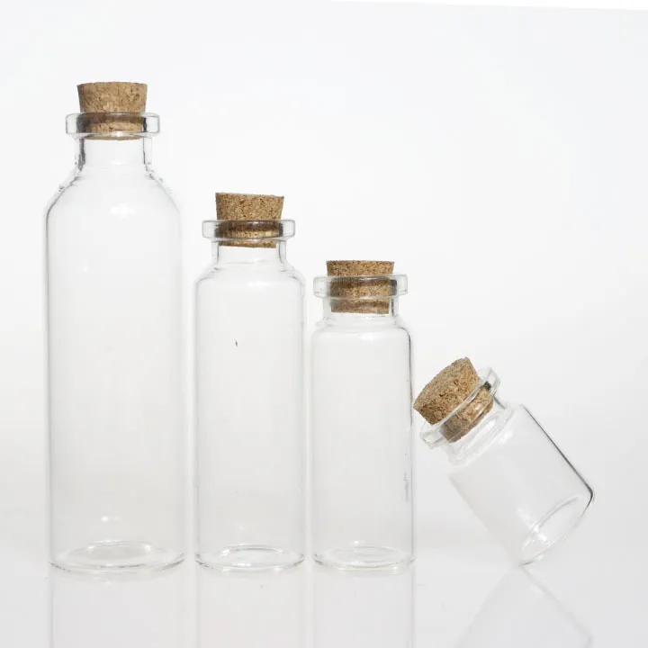 Frascos de vidrio transparente con tapones de corcho