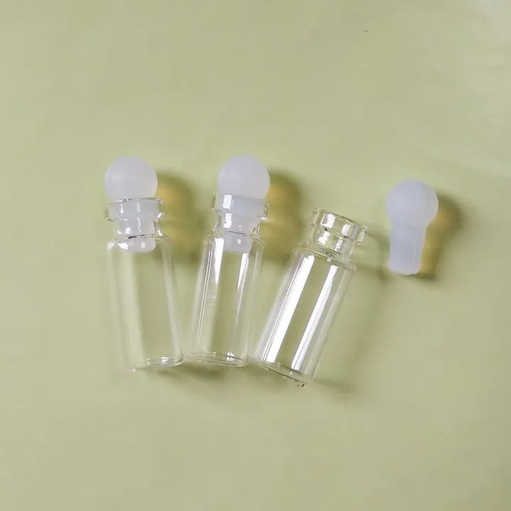 Clear glass vial with white silicone stopper