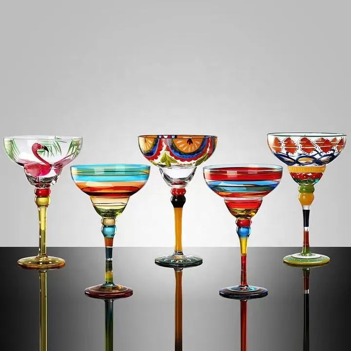 Five cocktail glasses with colorful hand-painted decorations