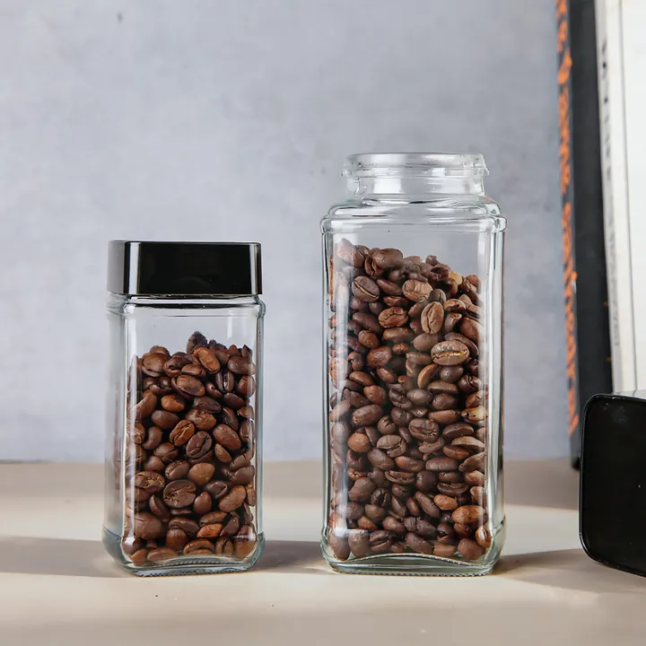Square glass storage jar with dark plastic lid