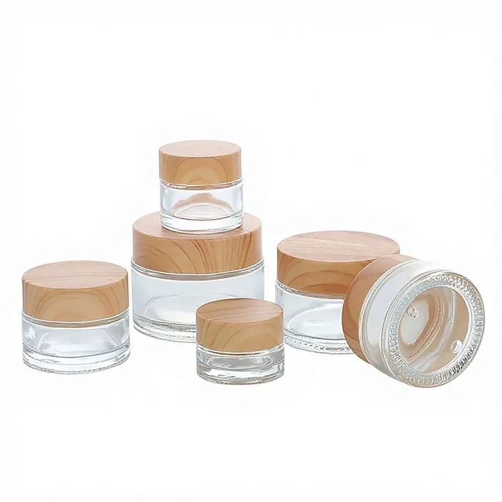 Clear cosmetic glass jars with wood grain lids