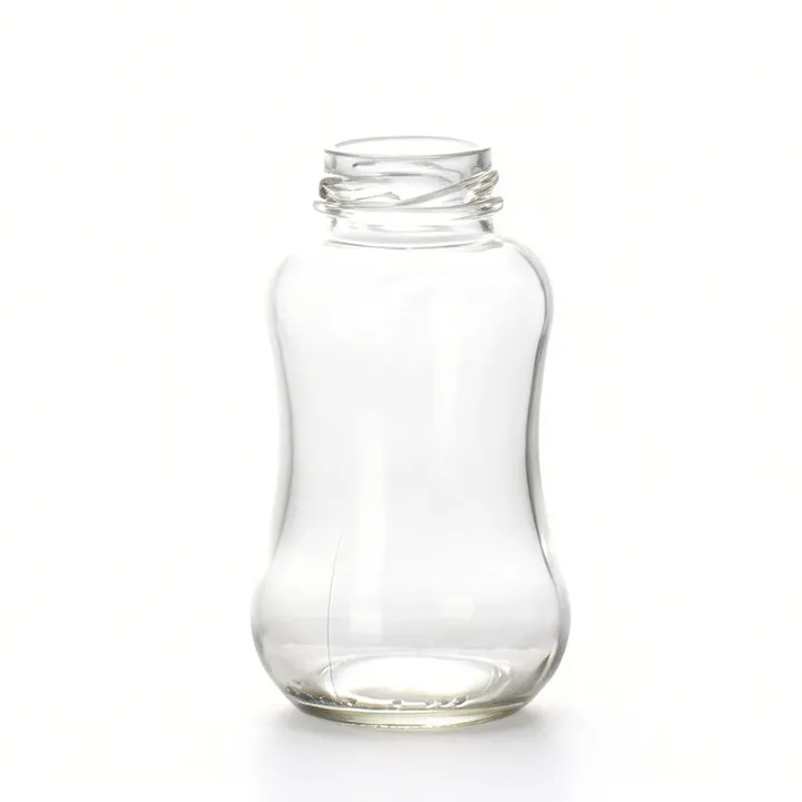 Saftflasche aus klarem, gewölbtem Glas mit weiter Öffnung