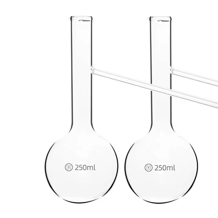 Two distilling flasks with side arm connections