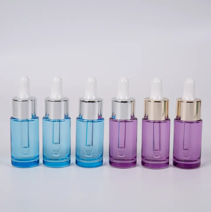 Clear dropper bottles with different colored dropper closures