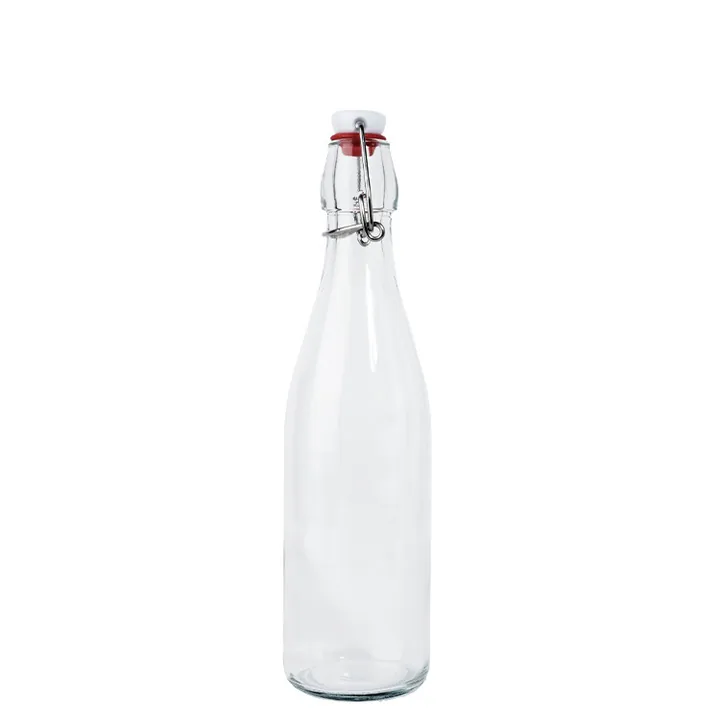 Botella de cristal alta y transparente con tapón abatible