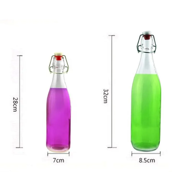 Dos botellas de cristal transparentes con tapón abatible y marcas de capacidad