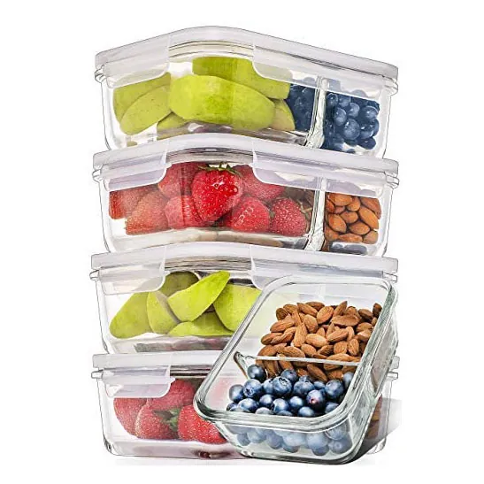 Stacked divided glass containers filled with fruit and nuts
