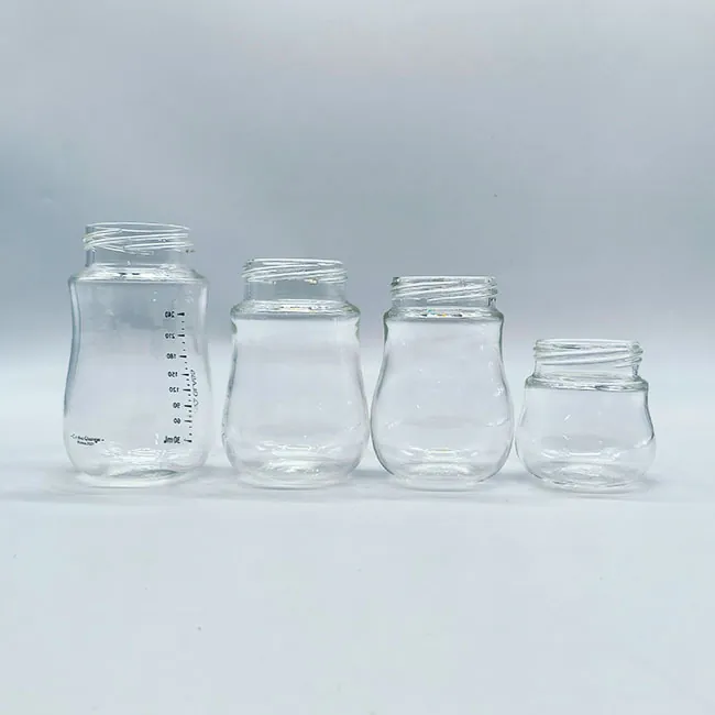 Multiple clear glass baby bottle bodies without nipples