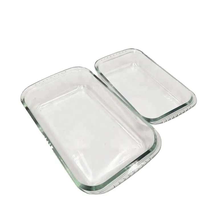 Deux plats de cuisson rectangulaires en verre aux parois striées