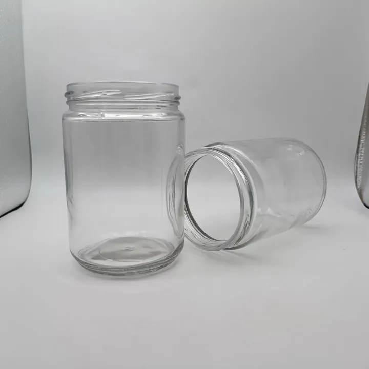 Zwei durchsichtige, runde Weithals-Glasgefäße ohne Deckel