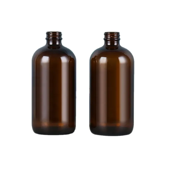 Two brown glass round shoulder packaging bottles