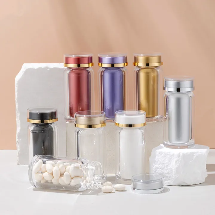 Transparent glass pill bottles with different colored bodies and metal lids