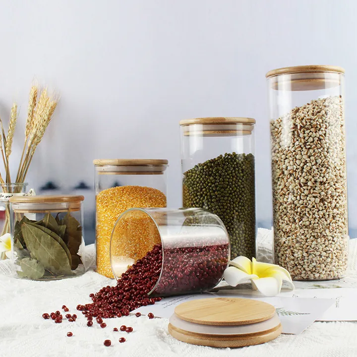 Glass storage jars with bamboo lids and grains