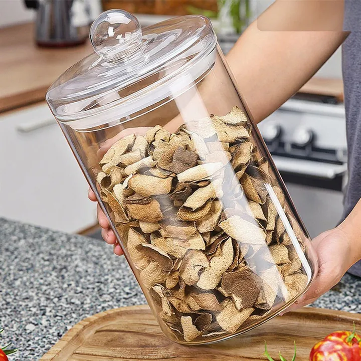 Large transparent glass storage jar with glass lid