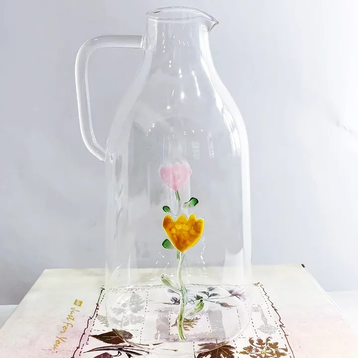 Théière haute en verre transparent, ornée d'un motif floral coloré en relief
