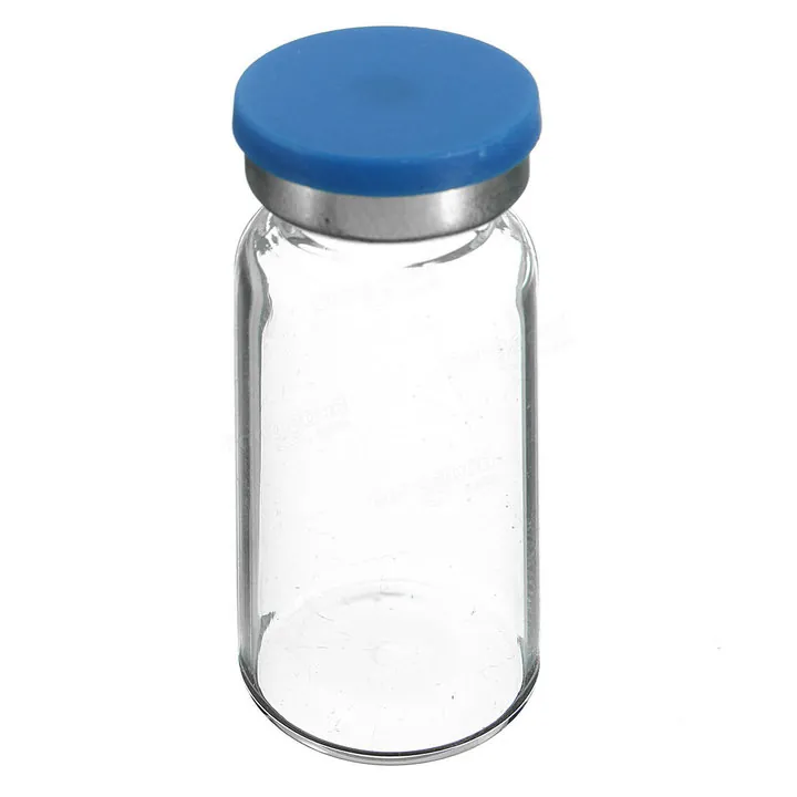 Clear glass vial with blue cap