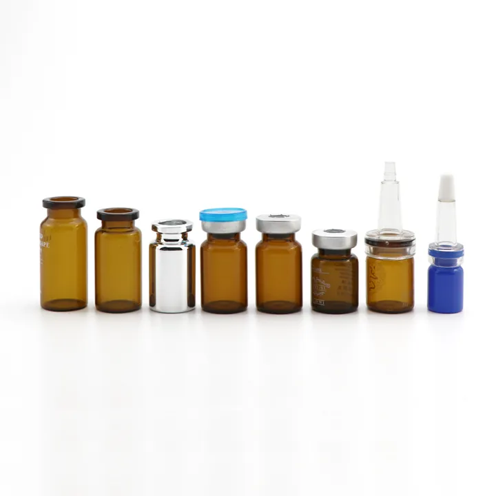 Clear and amber glass vials arranged in different sizes