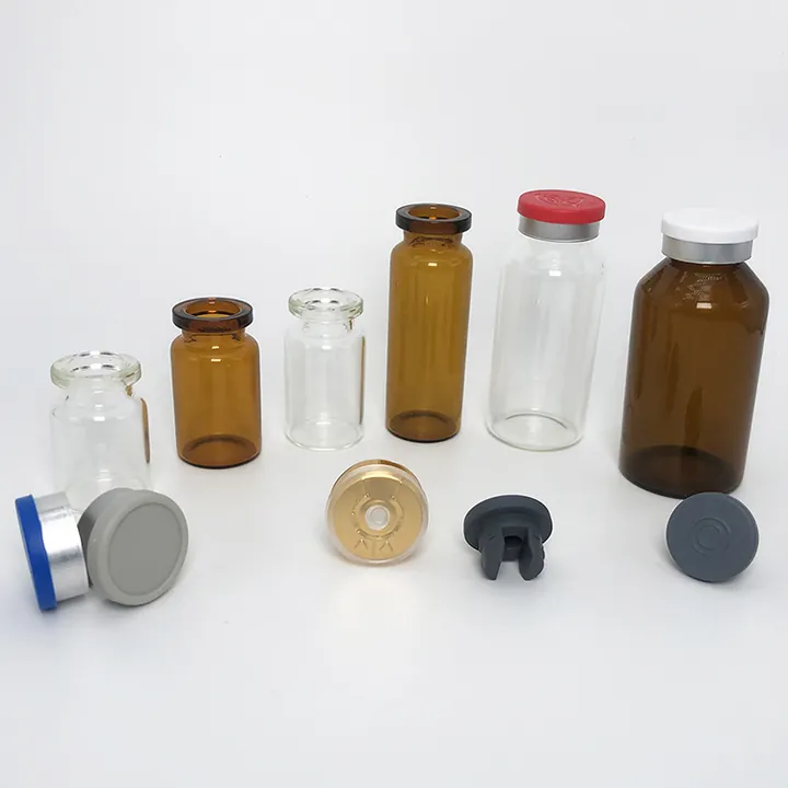 Clear and amber glass vials with rubber stoppers and caps