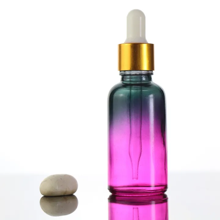 Matte black dropper bottles with cylindrical packaging
