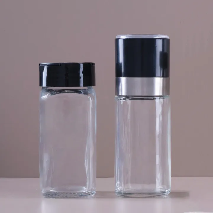Clear spice bottles with black dispensing caps