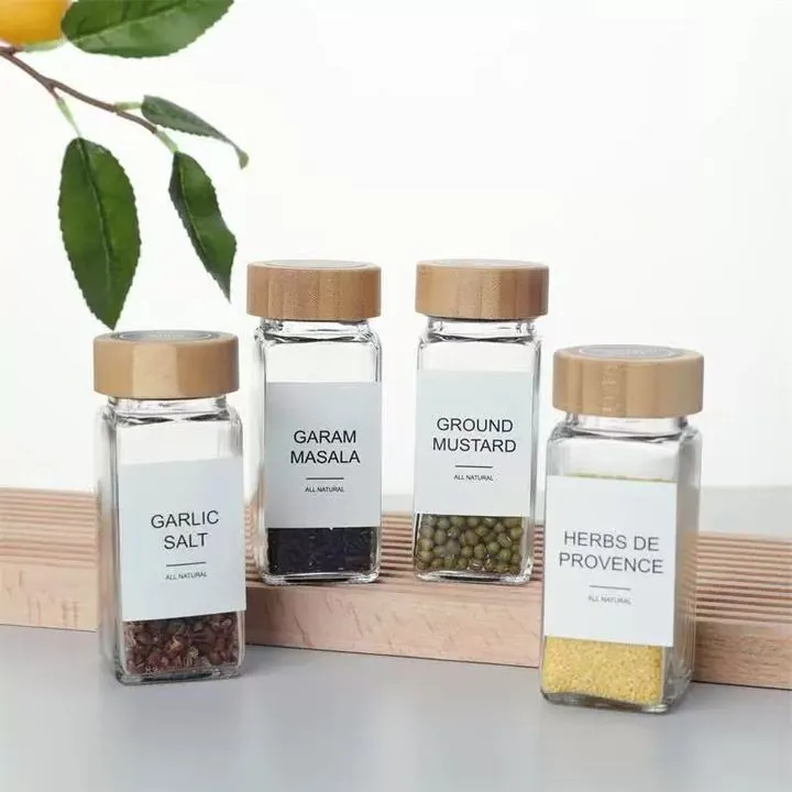 Square herb jars with bamboo lids and white labels