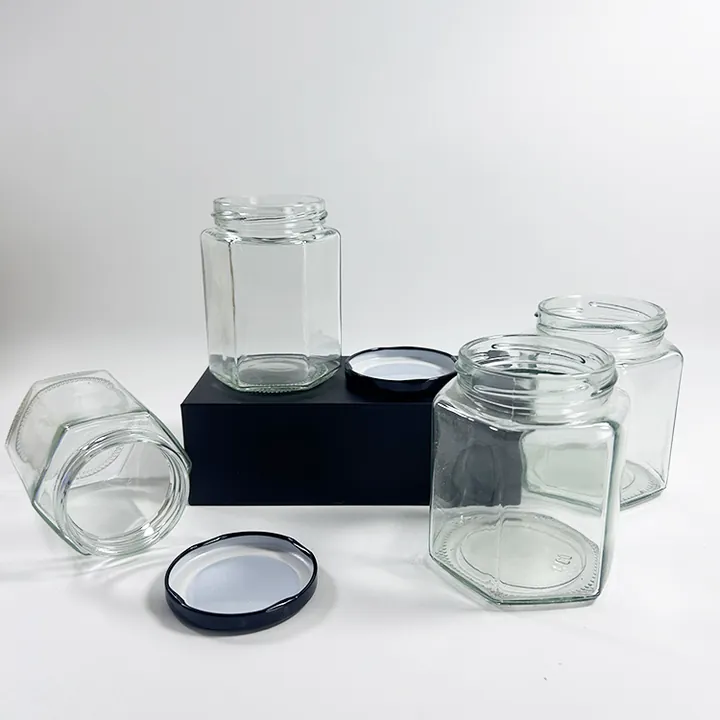Clear hexagon glass jars with black metal lids