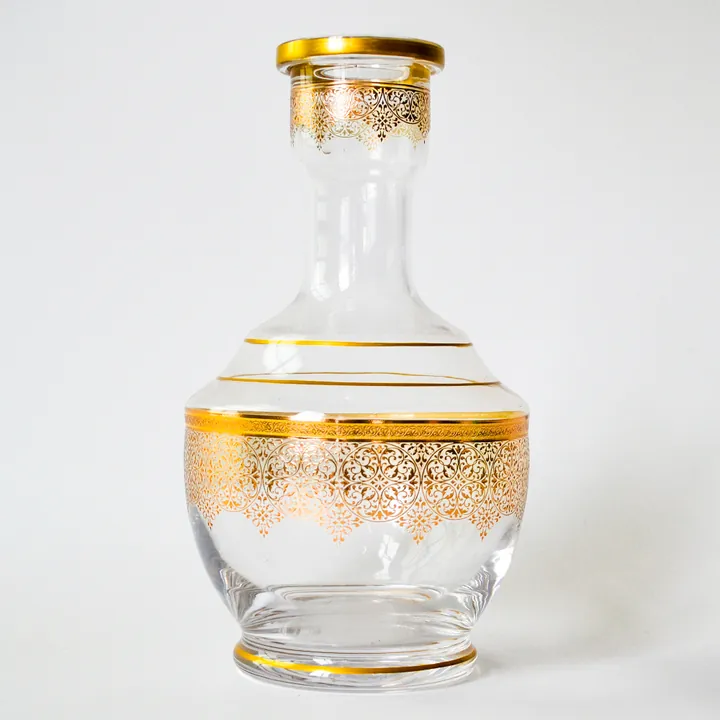 Round glass hookah bottle with gold decorative pattern