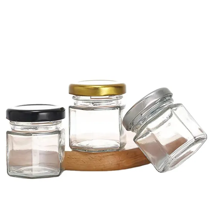 Mini glass jam jars with black gold and silver lids